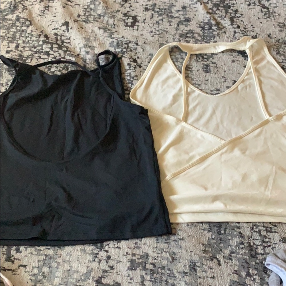 Born Primitive tank tops